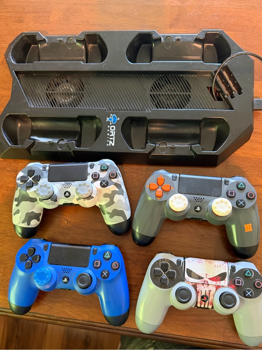 Ortiz vertical stand for PlayStation 4, 4 Sony dual shock 4wireless controllers.
